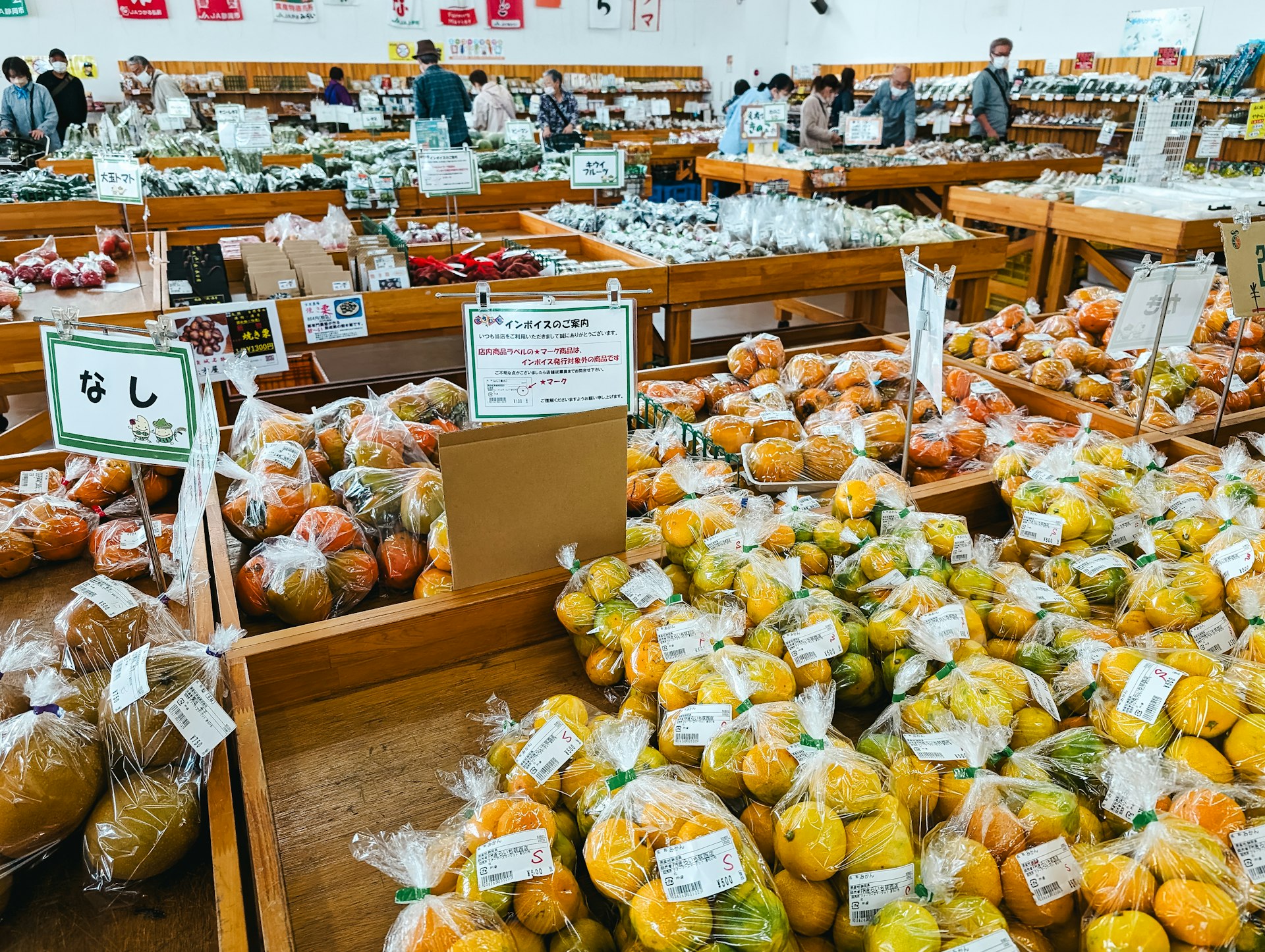 a store filled with lots of bags of fruit